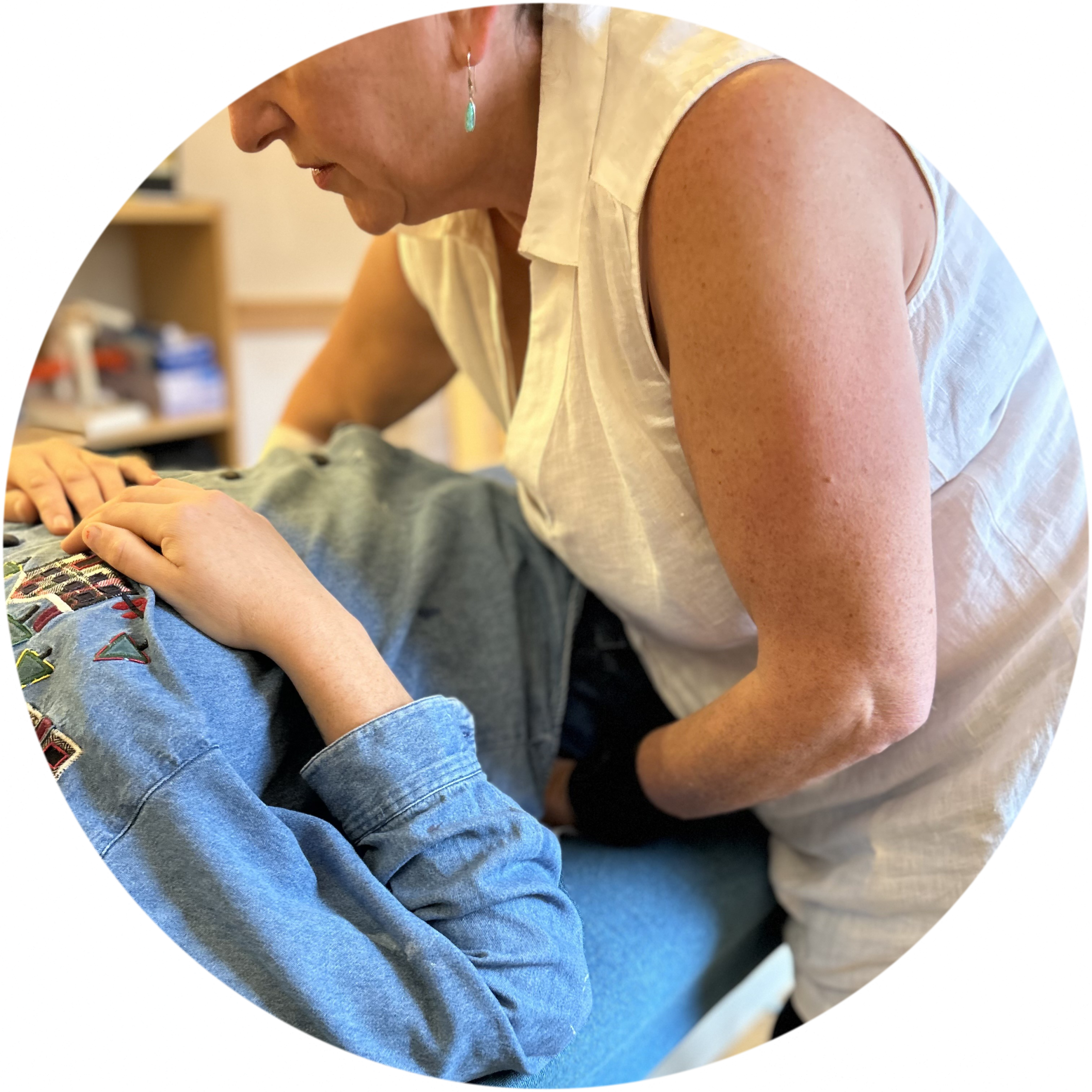 Jamie Rose practising Zero Balancing on a patient lying on a couch